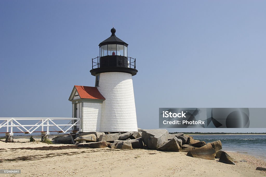 Brant Point lighthouse su una spiaggia di Nantucket - Foto stock royalty-free di Nantucket