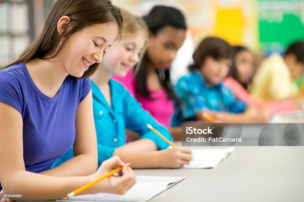 Diverse Elementary Class Diverse elementary students in the classroom. Classroom Stock Photo