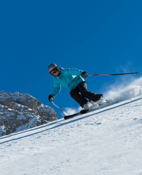 istock Young women skiing in the mountains 172405038