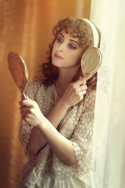istock retro beauty combing her hair 172405094