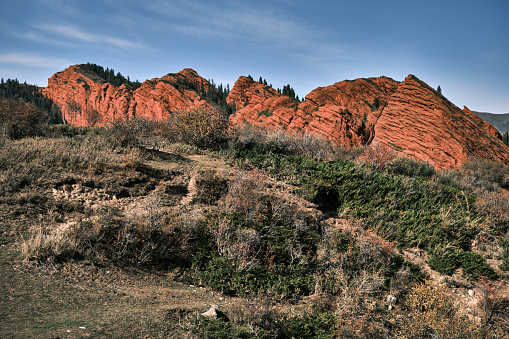 Red rocks of south Tien Shan in autumn. Jeti Oguz, Issyk-Kul region, Kyrgyzstan