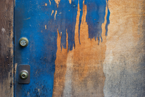 Distressed blue door.
