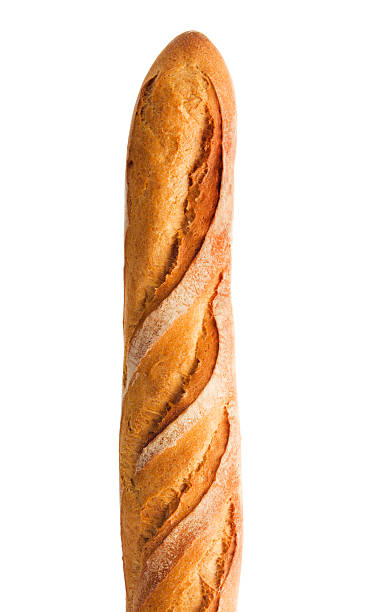 Baquette, Crusty French Bread Loaf, Starch Food Isolated on White Close-up of a baguette, a crusty French bread loaf that is a starch food for carbohydrates, isolated on a white background. baguette stock pictures, royalty-free photos & images