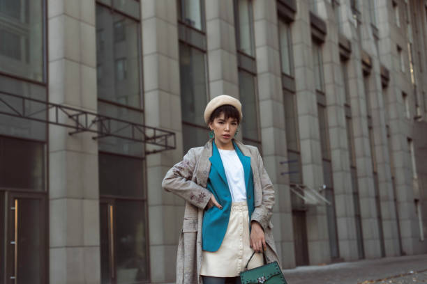 istock Brunette in a beret in the autumn city 1724059471