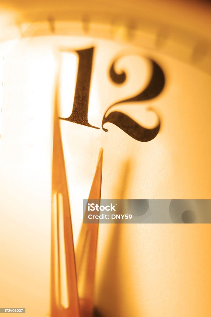 Time A clock about to strike midnight 12 O'Clock Stock Photo