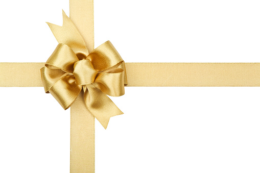 An elegant gold satin bow with a clipping path(BOW IS INTENTIONALLY OFF CENTER IN THIS IMAGE)