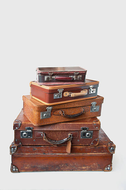 istock Group of vintage leather suitcases  with labels. 172406314