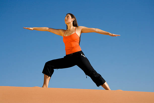 Beautiful Woman Practicing Yoga stock photo