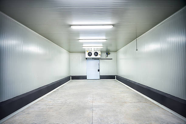 Meat or Fruit Storage at -30 Celcius "Empty storage in a meat processing factory. Big Industrial refrigerator or dryer for any kind of food, meat, fruit or vegetable. From -10 to -80 degrees celcius.See more images like this in:" cold storage stock pictures, royalty-free photos & images