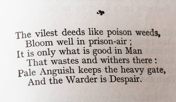 Poem by Oscar Wilde criticizing prisons, The Ballad of Reading Gaol Famous stanza about the despair and futility of prison life, from The Ballad of Reading Gaol by Oscar Wilde. From a pre-1942 edition of The Works of Oscar Wilde (the writer, playwright and wit who lived from 1854 to 1900): The vilest deeds like poison weeds,/ Bloom well in prison-air;/ It is only what is good in Man/ That wastes and withers there:/ Pale Anguish keeps the heavy gate,/ And the Warder is Despair. oscar wilde stock pictures, royalty-free photos & images