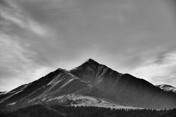 istock Snowcapped mountain peak in black and white 1724075778