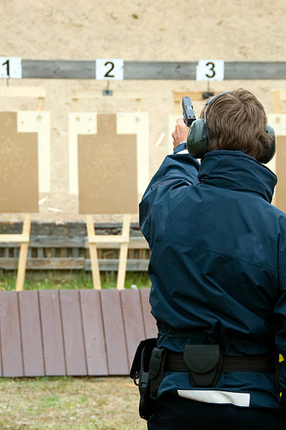 Target practicing with gun stock photo