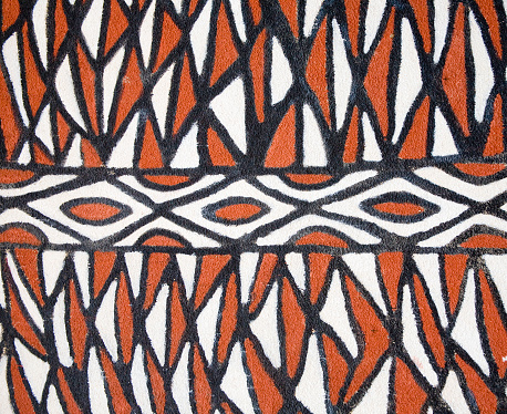 In northern Ghana and southern Burkina Faso, the Gourounsi (or Gurunsi) tribe traditionally paints their houses and other buildings in bright tritones of white, black and red-orange.  