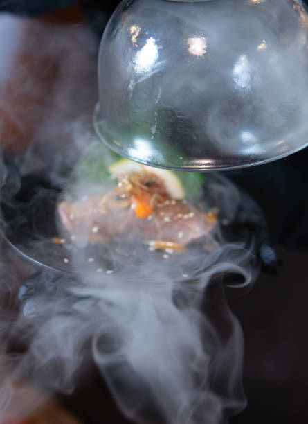 istock Close up hand holding Smoked Sushi 1724084148