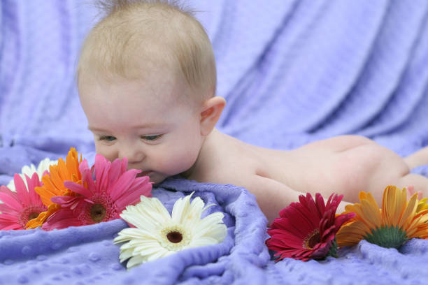 istock Baby and Flowers 172408986