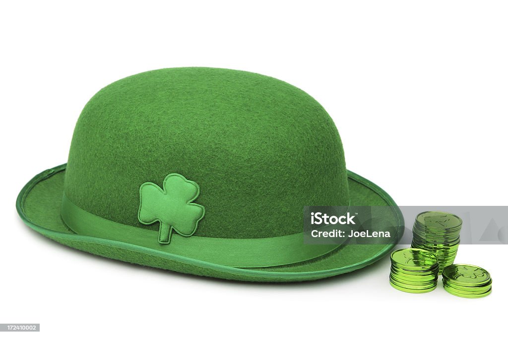Leprechaun Green Hat And Coins St. Patrick's Day leprechaun hat and lucky coins. Celebration Stock Photo