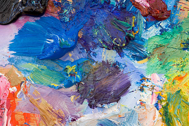 Artists oil paints multi coloured close up semi abstract