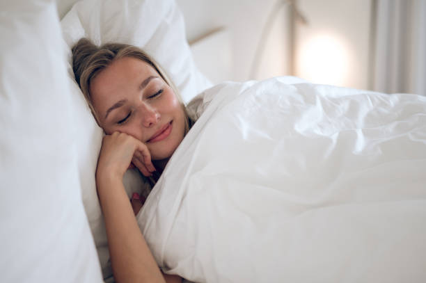 istock Cute long-haired girl sleeping and looking peaceful 1724101064