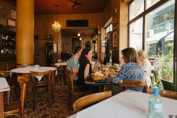 istock Group of friends on a brunch in a restaurant 1724101088
