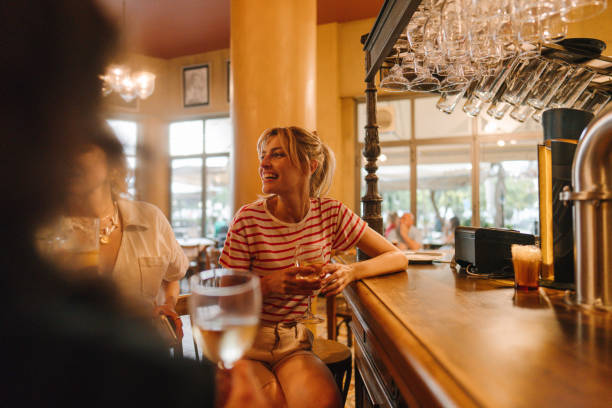 istock Female friends in a bar 1724101638