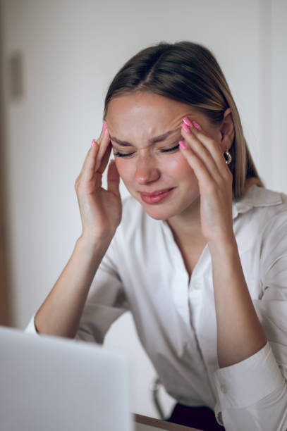 istock Young business woman feeling tired after a long working day 1724102395