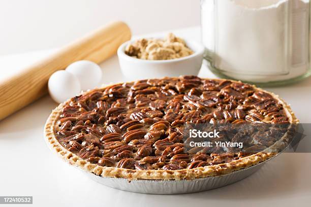Pecan Pie Fresh Baked Holiday Dessert With Ingredients Rolling Pin Stock Photo - Download Image Now