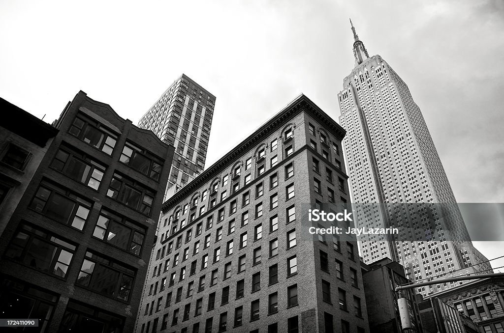 Empire State Building, da Quinta Avenida, e a paisagem urbana de Manhattan, Nova York - Foto de stock de 1930-1939 royalty-free