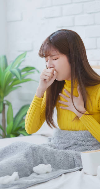 istock woman sick and cough 1724115127