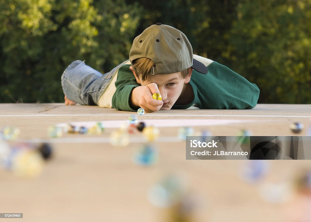 Jugando para mantiene - Foto de stock de Canicas libre de derechos