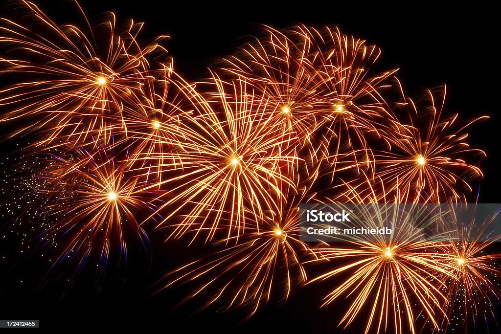 Firework 3 Golden fireworks exploding in the sky.More fireworks: Arts Culture and Entertainment Stock Photo