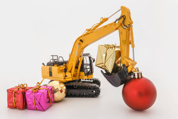 istock Christmas ornament and Excavator model 1724127804