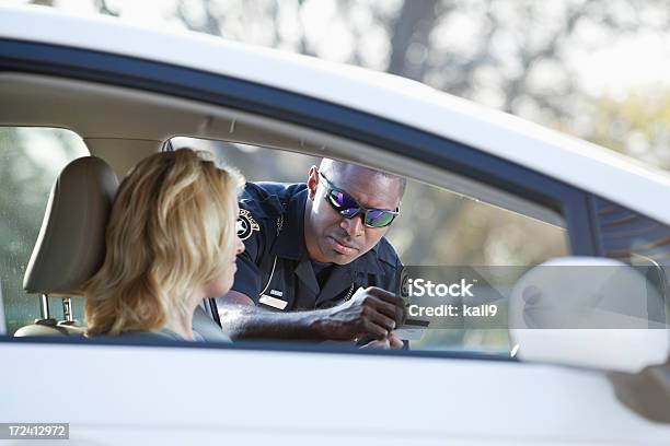 Woman Pulled Over By Police Stock Photo - Download Image Now - Driving, Police Force, Pulled Over by Police