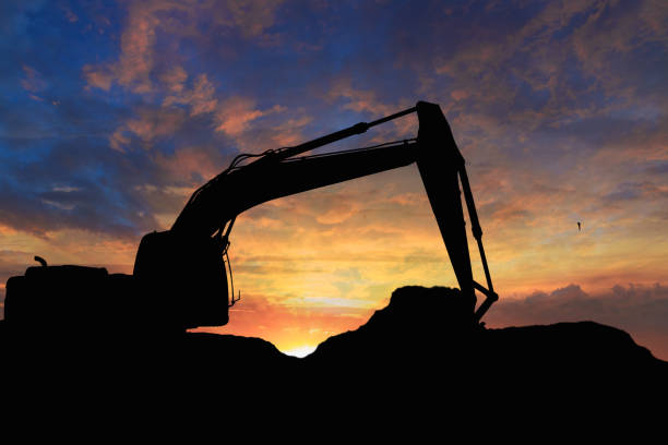 istock Crawler excavators silhouette are digging the soil 1724131189