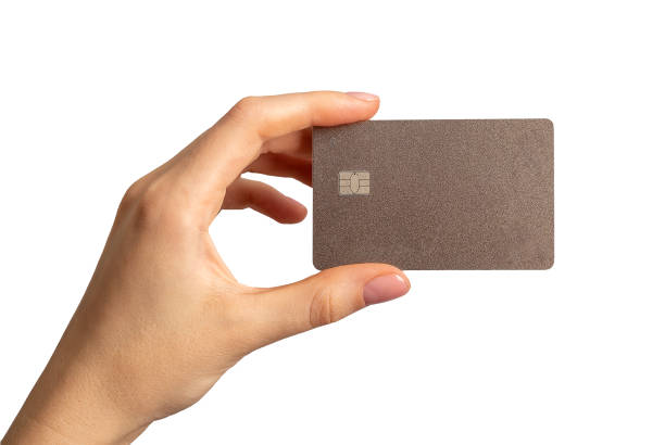 istock Hand holding bank card mock up, plastic with chip, isolated on white background 1724135107