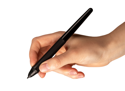 Pen in hand isolated on white. Signing something