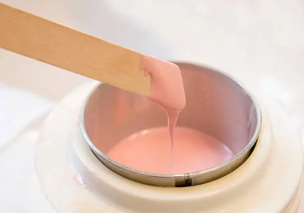 Photo of Hot pink wax used for hair removal