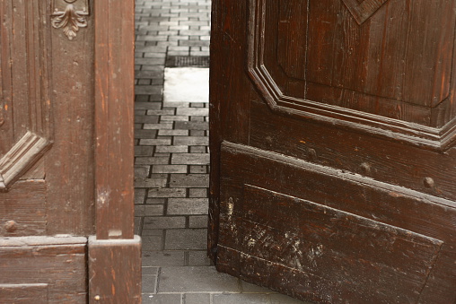 old wooden door, opened into the yard