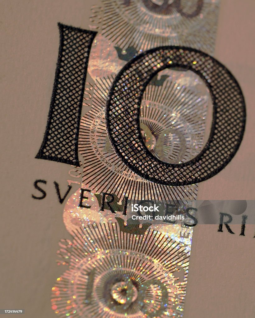 "Close-up of 100 Krona bill, showing the holographic strip.More  money related pictures here:[url=/my_lightbox_contents.phplightboxID=6238467 t=_blank][img=http://img14.imageshack.us/img14/2087/img1333money.jpg][/img][/url]" - Foto de stock de Moeda Sueca - Moeda Europeia royalty-free