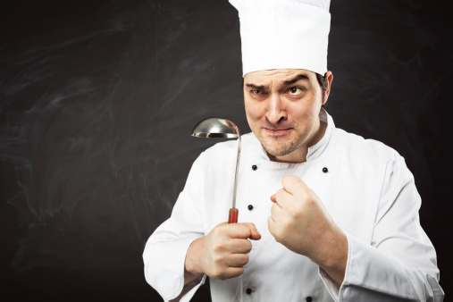 Angry Chef portrait on blackboard