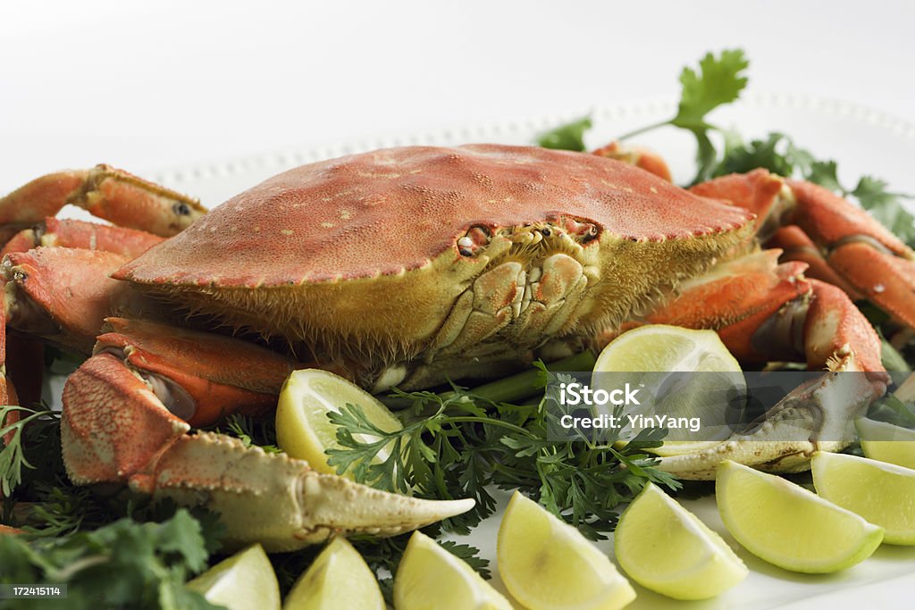 Granciporro del Pacifico con limone - Foto stock royalty-free di Frutti di mare