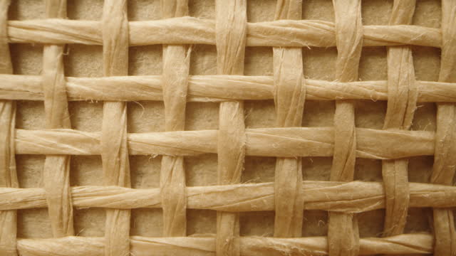 Woven texture, paper or wooden basket, macro fibers. Slider.