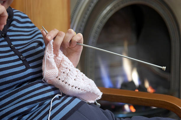 knitter 暖炉の - brick red wool heat ストックフォトと画像
