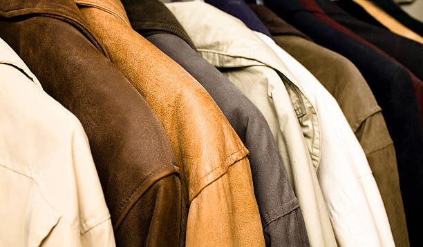 istock Fashion:  Winter coats and jackets in a row, hanging closet. 172415413