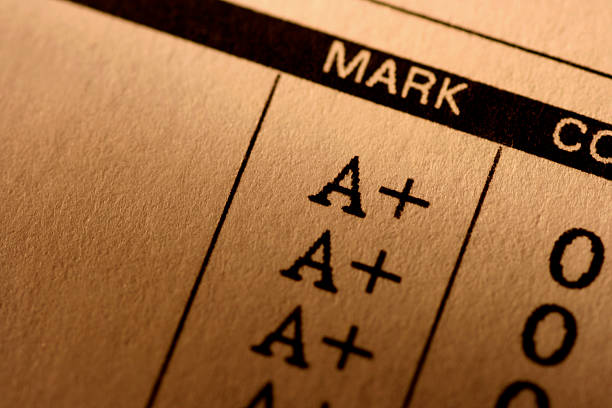 Report Card Perfect grades on a student's school report card. Ample copy space.For more of my Education images click below: progress report stock pictures, royalty-free photos & images