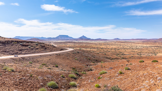 Adventurous road trip through a spectacular landscape, Damaraland, Namibia.  Horizontal.