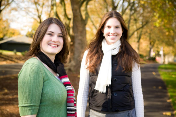 istock cute fall portrait of two girls 172417228