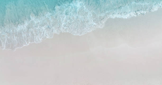 istock Beach Wave water in the Tropical summer beach with  sandy beach background 1724173137