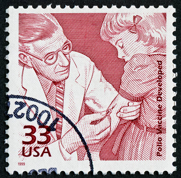Polio Vaccine Stamp Cancelled Stamp From The United States Of America Commemorating The Development Of The Polio Vaccine. polio vaccine stock pictures, royalty-free photos & images