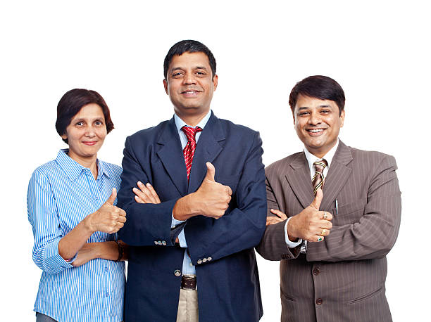 fröhlich überzeugt indischen corporate business-team - horizontal female with group of males posing looking at camera stock-fotos und bilder
