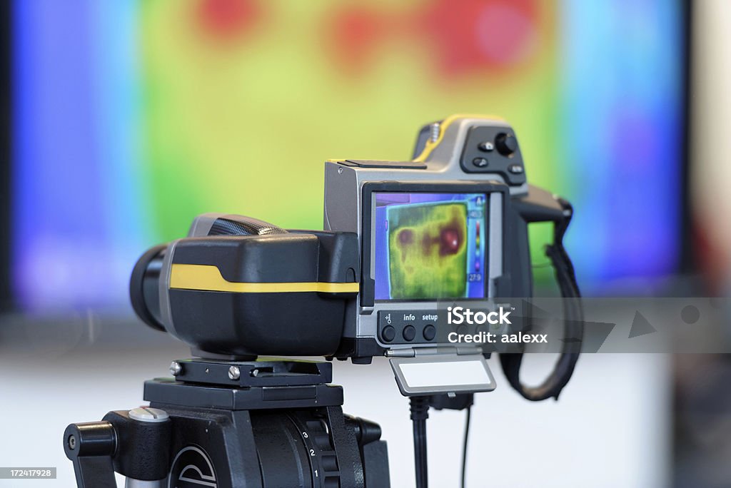 Thermal Imaging and Camera Heat Loss Detection of the House With Infrared Thermal Camera - Thermal Imaging for Building Diagnostics Thermal Image Stock Photo